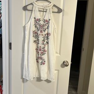White sleeveless floral dress